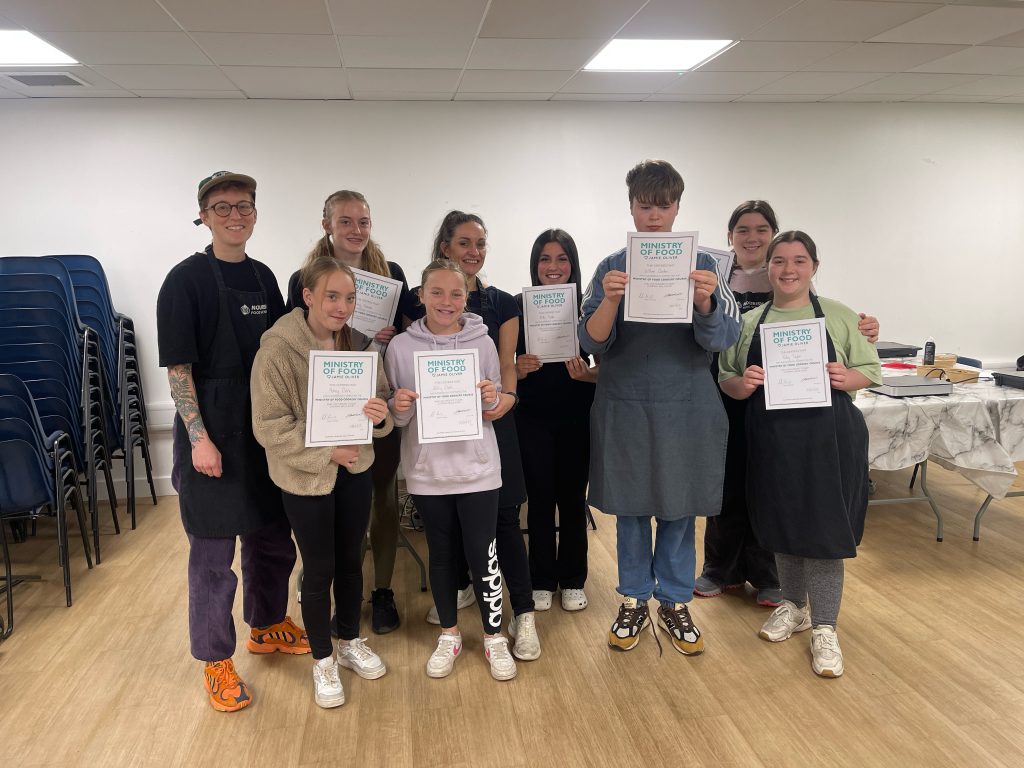 group of students completing a Jamie Oliver and Nourish Food School mental health food workshop